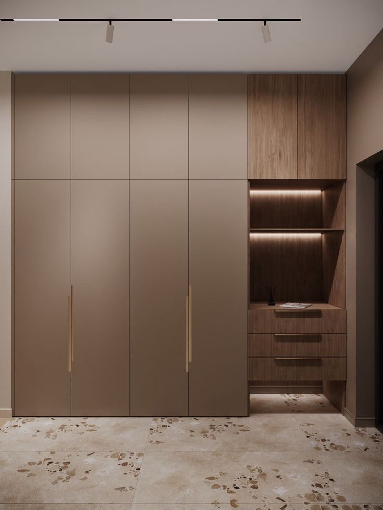 Taupe wardrobe design with lit display niche