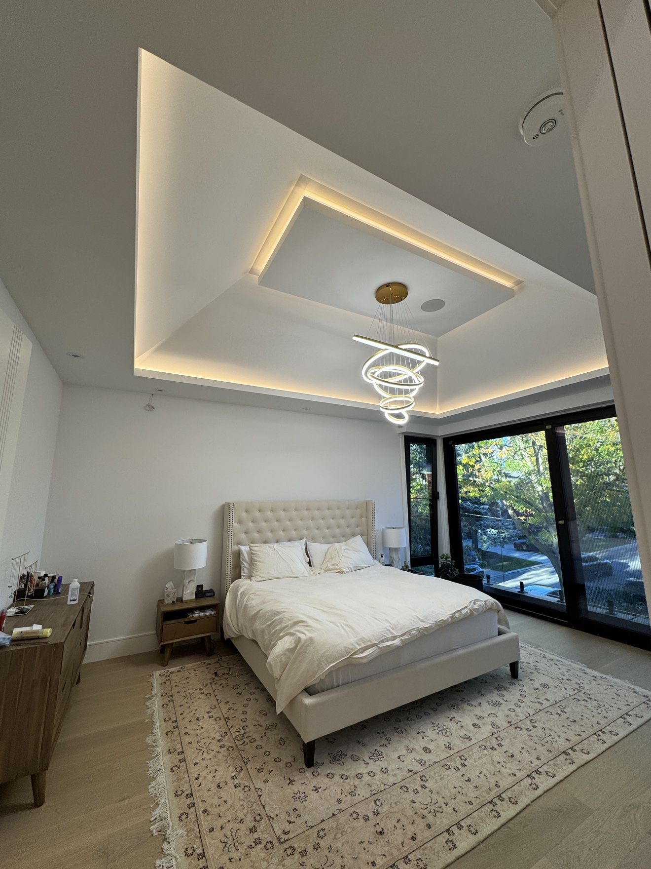 Master bedroom with cove-lit tray ceiling