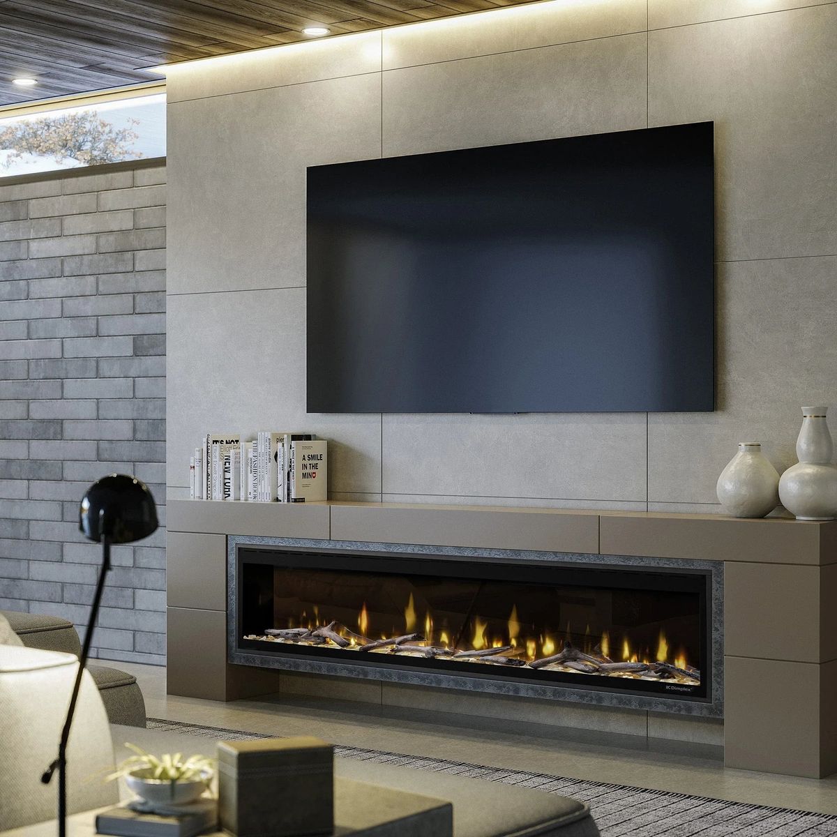 Dimplex Ignite Evolve 74 — linear electric fireplace beneath a TV on a media wall